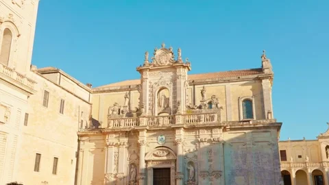 Lecce Piazza Duomo panoramic view with Cathedral and visitors Stock Footage 316295661