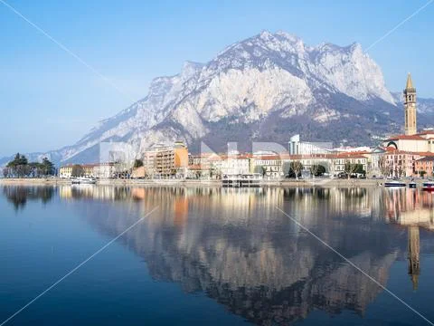 Lecco city on shore of Lario Como Lake Stock Photos