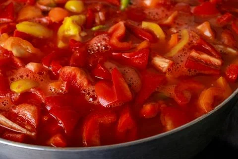 Lecho is stewed vegetable dish made from sweet peppers and tomatoes. Stock Photos
