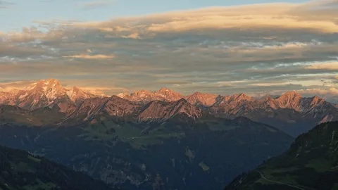 Lechquellengebirge cloudy sunset Stock Footage