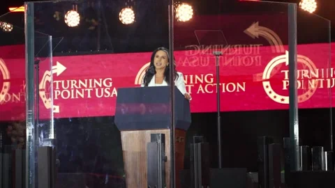 The lectern and stage during a speech at the Charlie Kirk memorial service Stock Footage 345298249