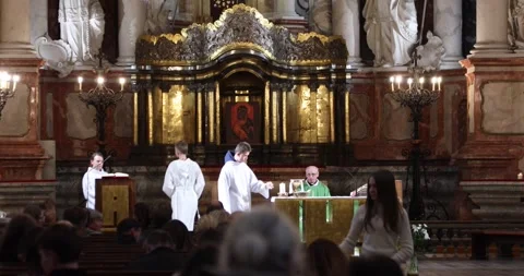 Lector reading during mass in Vilnius Church of St John Stock Footage 321050000