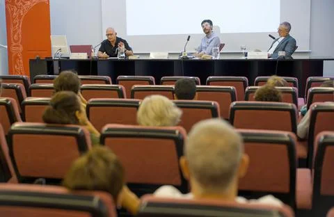 Lecture by three university professors, experts in psychology with students. Stock Photos