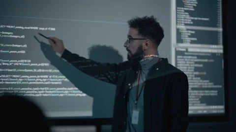 Lecturer Gives Presentation on Computer Science Stock Footage 163977980