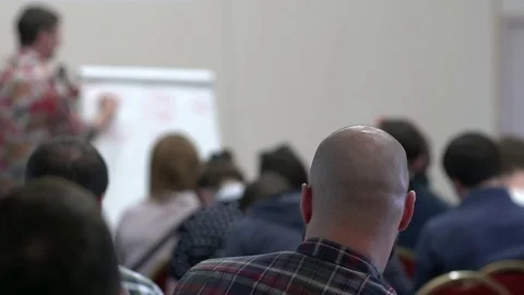 Lecturer speaking to his class in the lecture hall at the university. Skinhead 스톡 동영상 76269208
