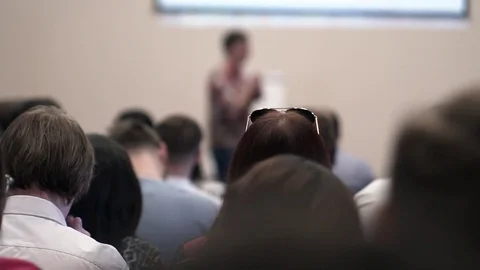 Lecturer speaking to his class in the lecture hall at the university Stock Footage 76311883