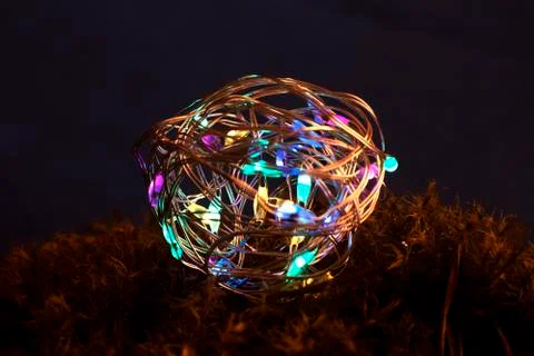 Led ball at moss background Stock Photos