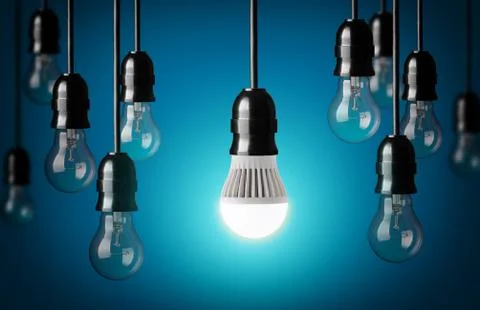 Led bulb and simple light bulbs.blue background Stock Photos