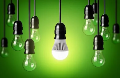 Led bulb and simple light bulbs.green background Stock Photos