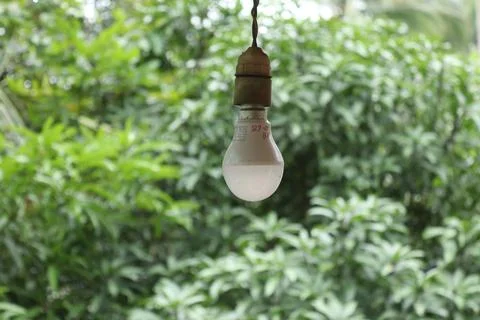 An LED bulb hanging Stock Photos