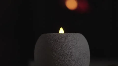 Led Candle With White Body On Black Background And Lamp Light At Top Stock Footage 324849049