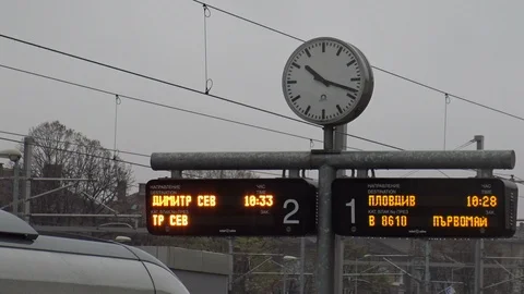 Led display with information on the station, big clock in foreground Stock Footage 101173868