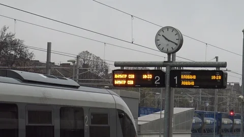 Led display with information on the station, big clock in foreground Stock Footage 101173912