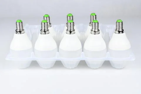 LED energy-saving light bulbs on a white table. ECO energy concept Stock Photos