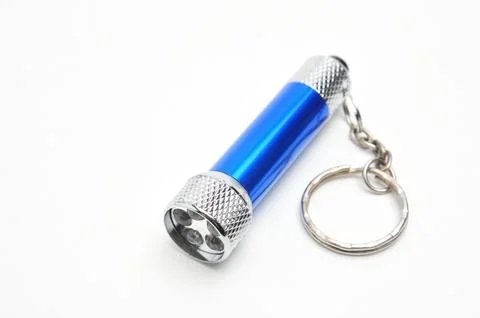 LED flashlight with the ability to recharge from the network on a white bac.. Stock Photos