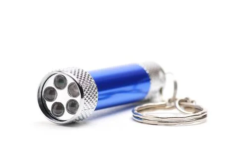 LED flashlight with the ability to recharge from the network on a white bac.. Stock Photos