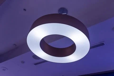 Led lamp on the ceiling in blue light Stock Photos