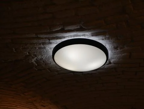 LED lamp in the dark. Ceiling Round Stock Photos