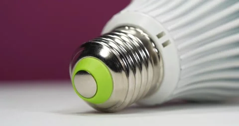 LED lamp with E27 base, close-up shot video Stock Footage 339569669