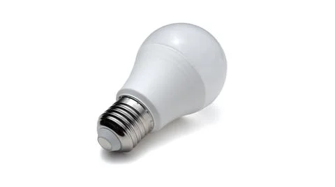 LED lamp with E27 screw base isolated on white background. Close-up photo Stock Photos