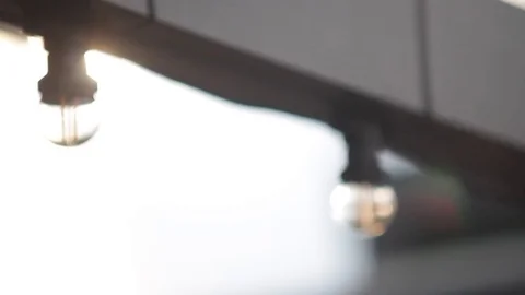 LED lantern bulb string lights with black wire for party yard patio Stock Footage 72603068