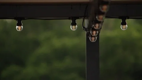 LED lantern bulb string lights with black wire for party yard patio Stock-Footage 72603196