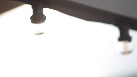 LED lantern bulb string lights with black wire for party yard patio Stock-Footage 73668620