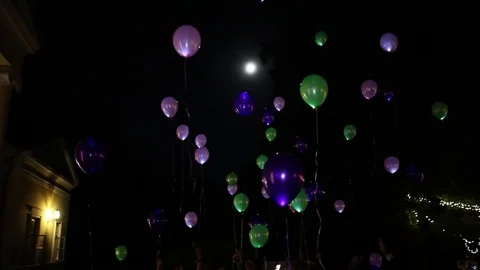 LED light balloons fly away in the night 動画素材 71675403