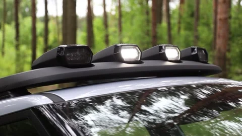 LED light bar on an off-road vehicle's roof Stock Footage 345594707