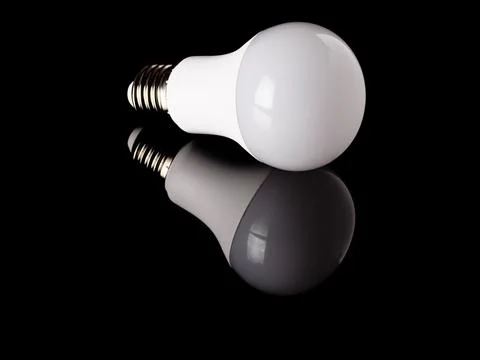 LED light bulb with reflection isolated on a black Stock Photos