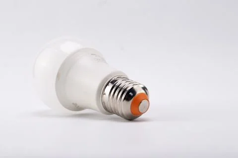 LED Light Bulb on White Background, Energy Efficient Lighting, Close-Up View. Foto stock