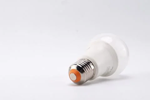LED Light Bulb on White Background, Energy Efficient Lighting, Close-up View. 写真素材