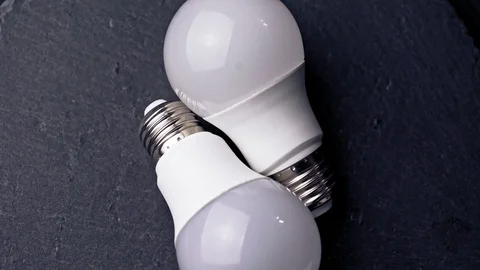 Led light bulbs on black background Stock Footage