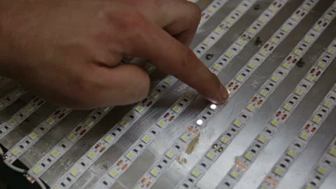 Led light bulbs light up due to the electrical conductivity of the skin. Non-ins Stock Footage 108653476