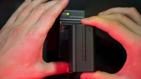 LED Light Lithium Li-ion Battery Charging NP-F750 F770 7.4V 5000mAH Stock Footage 119165344