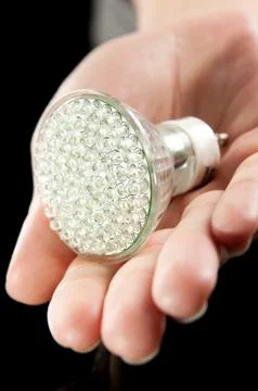 Led lightbulb in hand Foto stock