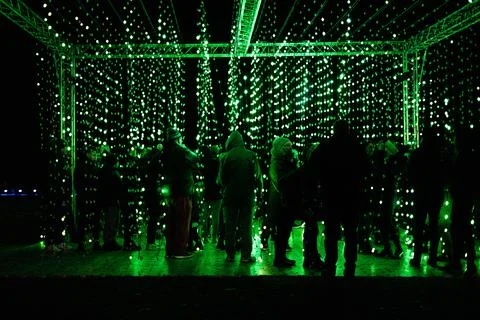 Led lighting people enjoying christmas lighting 스톡 사진