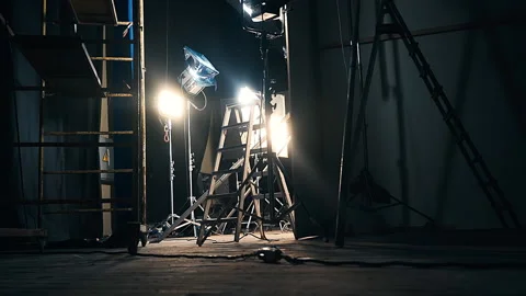 Led lightning systems with color filters and stairs in pavilion. Movie set Stock Footage 148791276