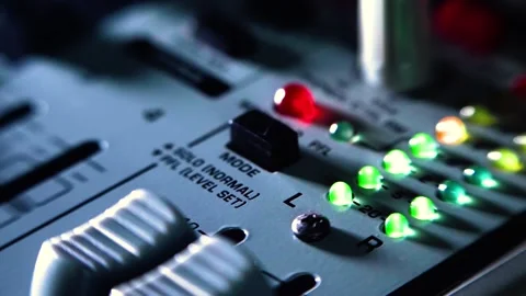 Led lights blinking on audio mixer, shallow dof Stock Footage