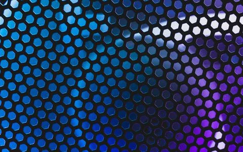 Led lights shines through the ventilation grid holes of computer air cooling  Foto stock