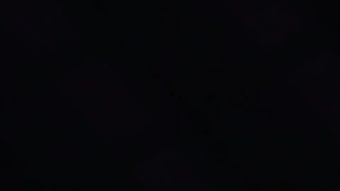 LED linear light on a black background. The lamp with the led tape slowly turns Stock Footage 221699527