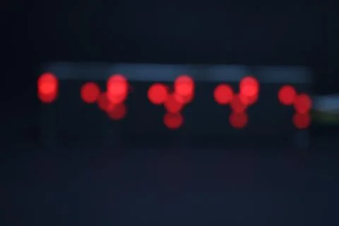 LED matrix display showing pattern of lights in blurred background Stockfoto's