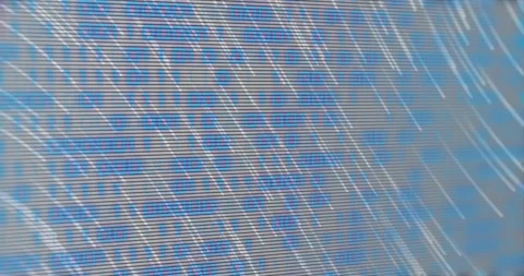 LED panel catching upper-left flare, blue glyphs blurring under diagonal Stock Footage 321700232