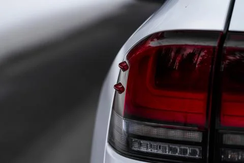 LED red taillight. Closeup tail light of a modern car. Rear light of a car. Stock Photos