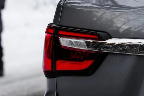 LED red taillight. Closeup tail light of a modern car. Rear light of a car. Stock Photos