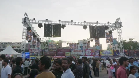 Led screen with lighting rigs on Grand Sataabdi Utsav event and heavy crowd at Stock Footage 342031396