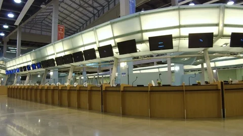 Led screens above empty check-in counters at Port Everglades terminal 25 Video stock 117749679