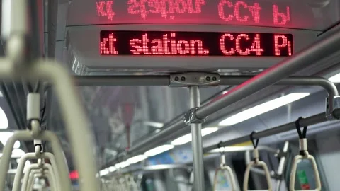 Led station sign inside train subway commuting public underground train in .. Stock Footage 259789846