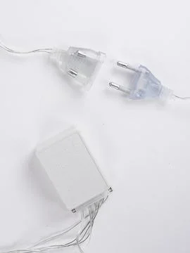 Led string light plug and power adapter Stock Photos