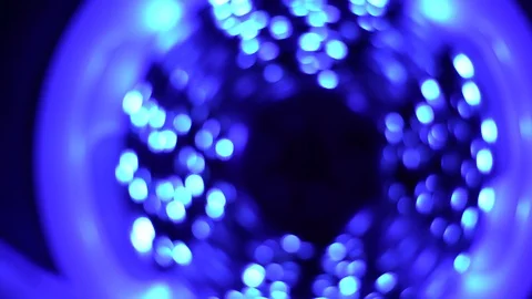 Led strip coil closeup. Diode shining stripe on dark blue background. Stock Footage 113010488